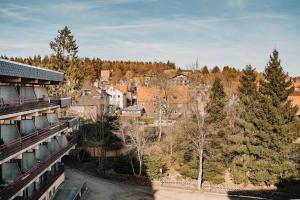 a view of a city from a building at Haus Vier Jahreszeiten am See HS 939 in Hahnenklee-Bockswiese