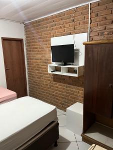 TV a/nebo společenská místnost v ubytování Pousada Água Viva