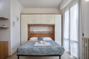 Ένα ή περισσότερα κρεβάτια σε δωμάτιο στο Iside - Sweet Dreams in Florence