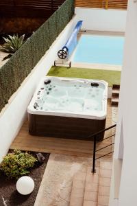 Bazén v ubytování Villa Vhana nebo v jeho okolí + 24 fotografií