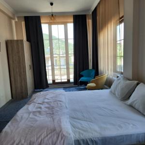 Ένα ή περισσότερα κρεβάτια σε δωμάτιο στο Yeşilgöl doğa evleri