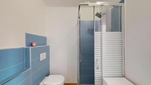 Et badeværelse på CliVio - By Ligooria