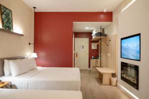 Postel nebo postele na pokoji v ubytování Hotel Cordialle