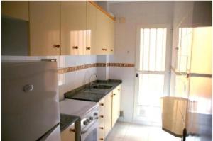 Kuchnia lub aneks kuchenny w obiekcie Apartamentos los Boliches