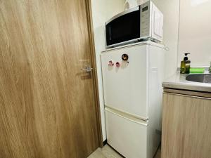 202 黒門市場1分!道頓堀まで徒歩8分!心斎橋まで徒歩9分!にあるキッチンまたは簡易キッチン