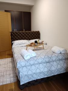 Letto o letti in una camera di Zemun residence