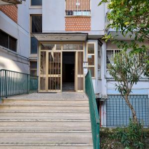 a staircase leading to a building with a door at Casa Graziosa in Ercolano