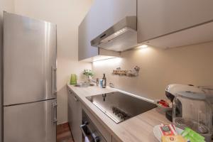 Cucina o angolo cottura di Pontaccio, 4 – Vivere in Brera, con ampio terrazzo
