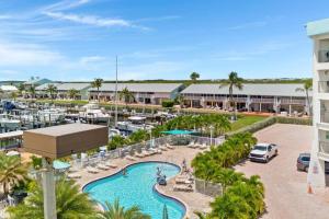 an aerial view of the pool at a resort at Overlooking Marina/Ocean view & FREE GOLF CART in Key Largo