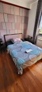 Łóżko lub łóżka w pokoju w obiekcie M Hostel