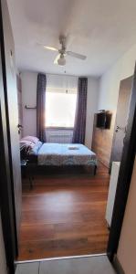 Łóżko lub łóżka w pokoju w obiekcie M Hostel