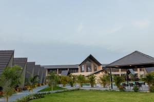 a rendering of the exterior of a resort at Regenta Resort Vindhyachal, Statue of Unity in Kevadia