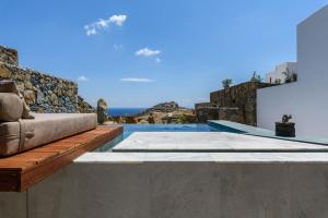 a view of a swimming pool from a villa at Charisma Hotel and Wellness Suites in Plintri