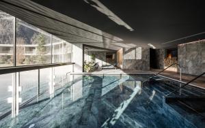 The swimming pool at or close to OLM Nature Escape - Eco Aparthotel