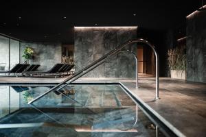 The swimming pool at or close to OLM Nature Escape - Eco Aparthotel