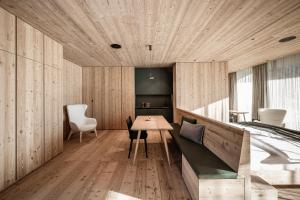 A seating area at OLM Nature Escape - Eco Aparthotel