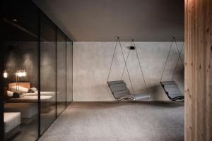 A bed or beds in a room at OLM Nature Escape - Eco Aparthotel