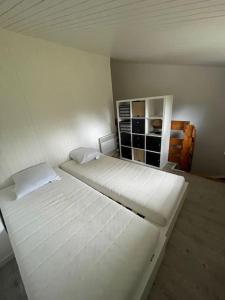 En eller flere senger på et rom på Appartement bien placé - 2105