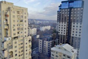 an aerial view of a city with tall buildings at Потрясающий уголок в сердце Кишинёва in Chişinău