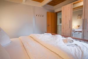 Postel nebo postele na pokoji v ubytování Haus Möwe
