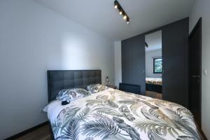 Ένα ή περισσότερα κρεβάτια σε δωμάτιο στο Anja Sousza Apartment