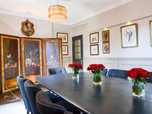 a dining room with a table and chairs at 5 Bed in Hurst Green 46916 in Robertsbridge