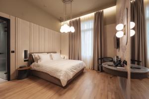 Ein Bett oder Betten in einem Zimmer der Unterkunft Zenith Premium Suites