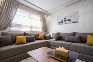 Posezení v ubytování Appart-Hotel IMMOKA + 17 fotografií
