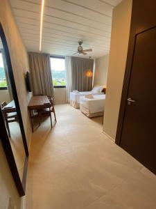 Cama ou camas em um quarto em Pousada Yamandu - Piscinas Aquecidas