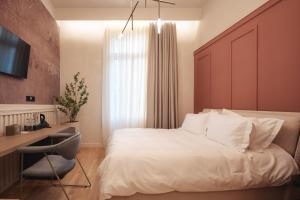Ein Bett oder Betten in einem Zimmer der Unterkunft Zenith Premium Suites