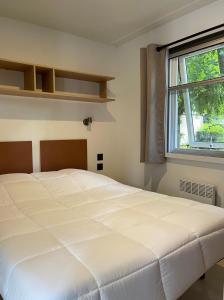 Postel nebo postele na pokoji v ubytování Camping Les Portes de Sancerre
