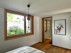 Ένα ή περισσότερα κρεβάτια σε δωμάτιο στο Stylish chalet w/Sauna: Alpine escape +42 φωτογραφίες