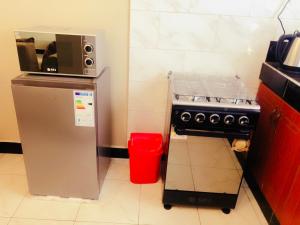 Η κουζίνα ή μικρή κουζίνα στο Zuri Comfy Retreat