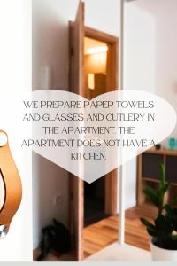 a sign that says we prepare paper towels and diseases and criticism in the apartment at Mátyás Corner Apartments Green Square Studio Apartment II in Budapest