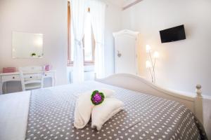Postel nebo postele na pokoji v ubytování B&B Vatican's Keys