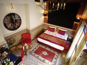 Postel nebo postele na pokoji v ubytování Riad El Amine Fès - Historic Hotels Worldwide
