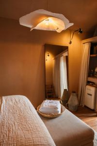 Ein Bett oder Betten in einem Zimmer der Unterkunft Vinha by NHôme