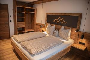 Postel nebo postele na pokoji v ubytování Pension-Appartement Sonnwend