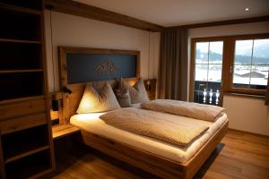 Postel nebo postele na pokoji v ubytování Pension-Appartement Sonnwend