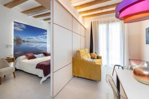 Posteľ alebo postele v izbe v ubytovaní C&C Apartments