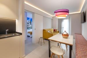Televízia a/alebo spoločenská miestnosť v ubytovaní C&C Apartments