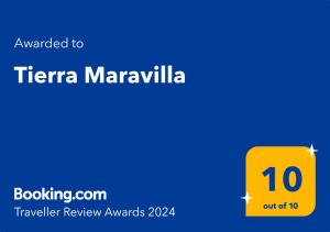 Certifikat, nagrada, logo ili neki drugi dokument izložen u objektu Tierra Maravilla