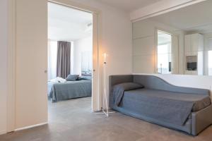 Posteľ alebo postele v izbe v ubytovaní Perla Verde Hotel