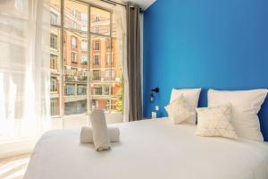 Posteľ alebo postele v izbe v ubytovaní Appartement lumineux et spacieux - 8P