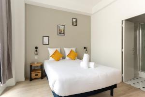 Posteľ alebo postele v izbe v ubytovaní Appartement lumineux et spacieux - 8P