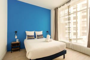 Posteľ alebo postele v izbe v ubytovaní Appartement lumineux et spacieux - 8P