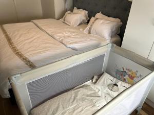 an empty bunk bed in a room at Scandpoint Apartment Lillestrom -Cosy 3 rooms flat with free Parking, EV Charger 18 min from Airport in Lillestrøm
