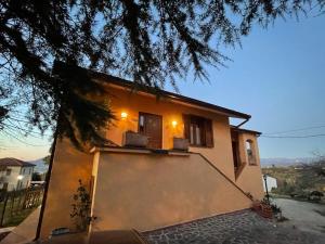 a house with a basketball court in front of it at B&B Lattrazionedelgeco in Terni