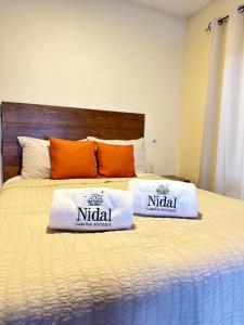 Cama o camas de una habitación en NIDAL CABAÑAS BOUTIQUE