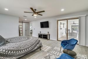 a bedroom with a bed and a ceiling fan at Sunny Arizona Oasis with Views - 2 Mi to Lake Havasu in Lake Havasu City